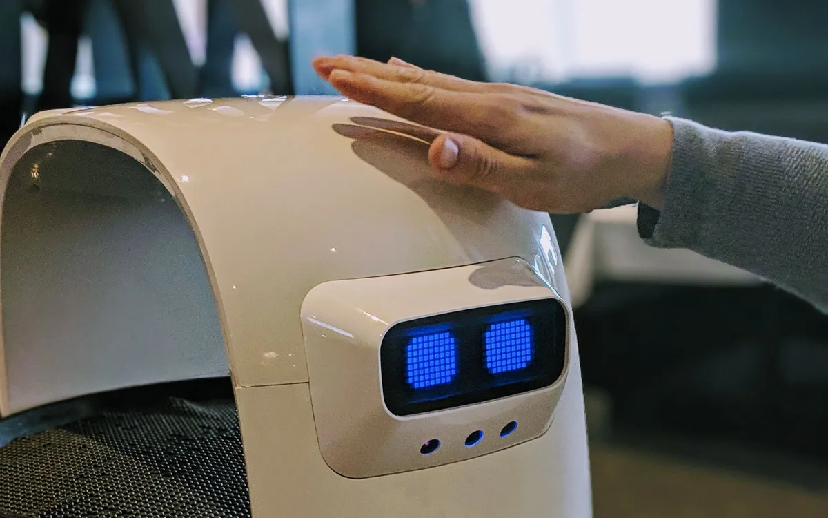 Service robot greeting a guest at a hospitality venue